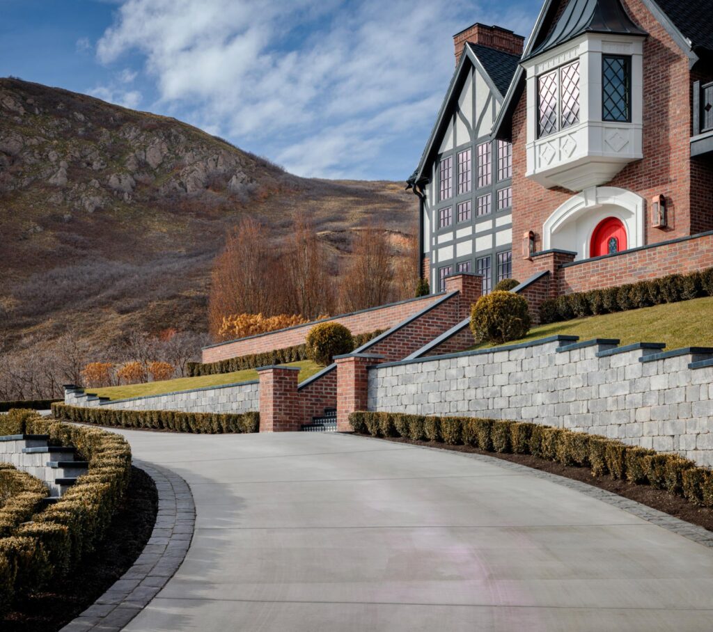 Driveway at Tan France home, featuring Belgard pavers 